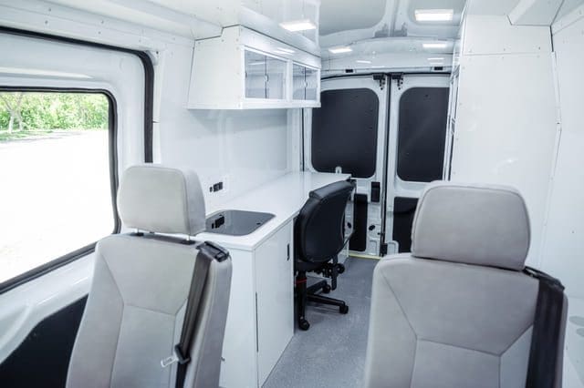 Mobile Outreach Unit with office space and passenger seats