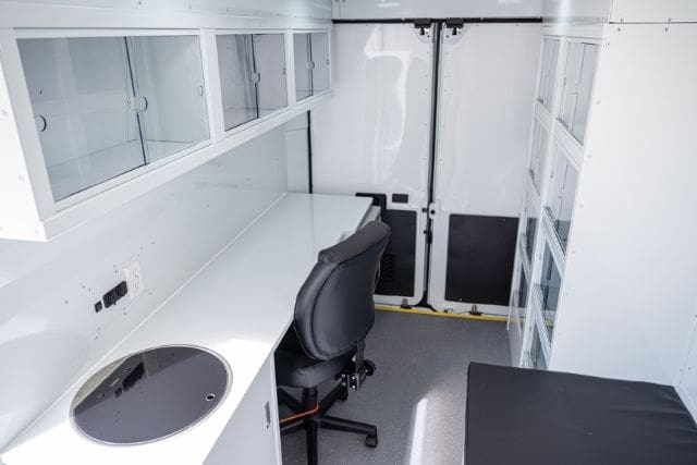 Office desk and chair in the Mobile Medical Clinic Van