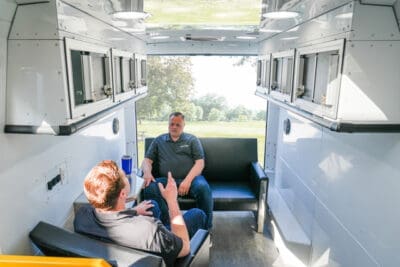 AVAN Mobility Counseling Van With Two People Talking