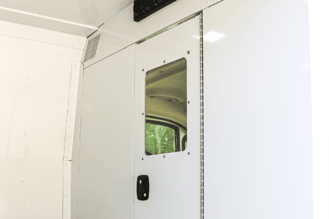 Privacy cab divider in a Mobile Clinic Van.